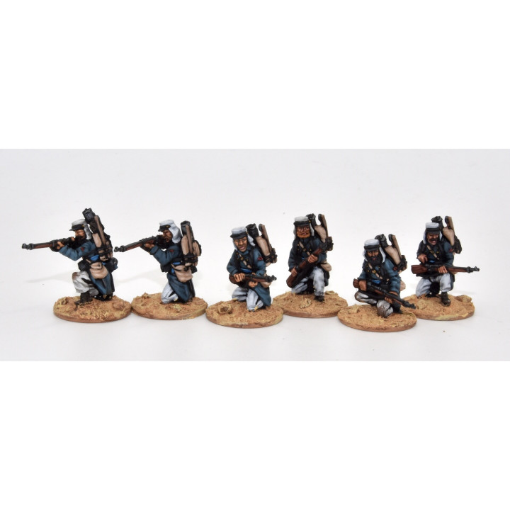 Légionnaires firing line kneeling, full marching order (knapsack)