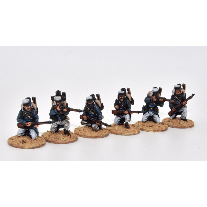 Légionnaires firing line kneeling, full marching order (knapsack)