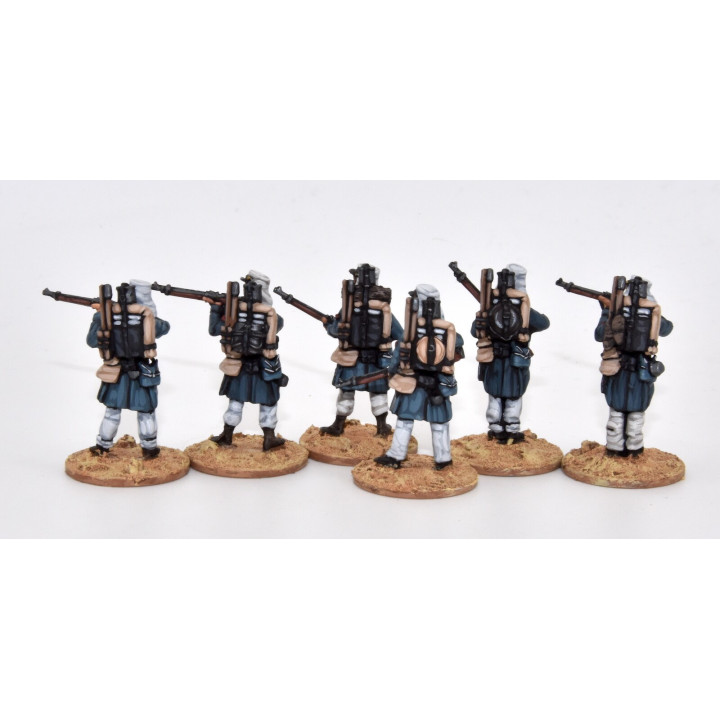Légionnaires firing line, full marching order (knapsack)