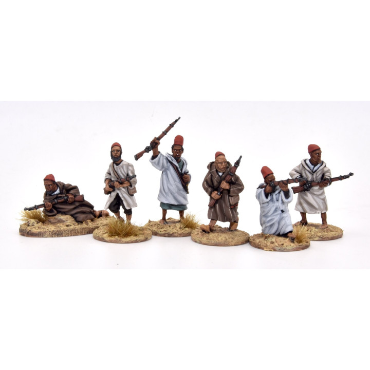 Arab/Berber on foot, caps and rifles