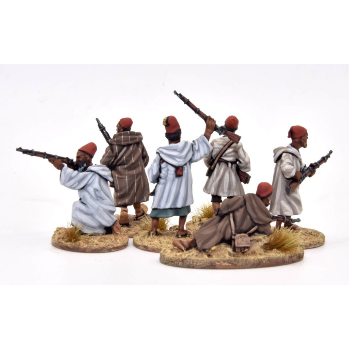 Arab/Berber on foot, caps and rifles