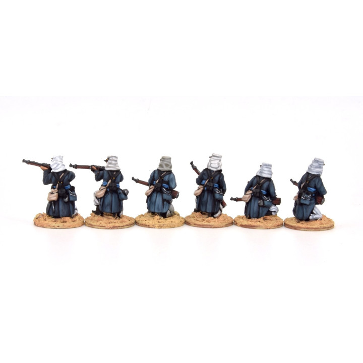 Légionnaires firing line kneeling, full marching order (knapsack)