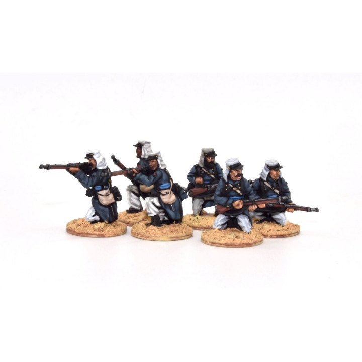 Légionnaires firing line kneeling, full marching order (knapsack)