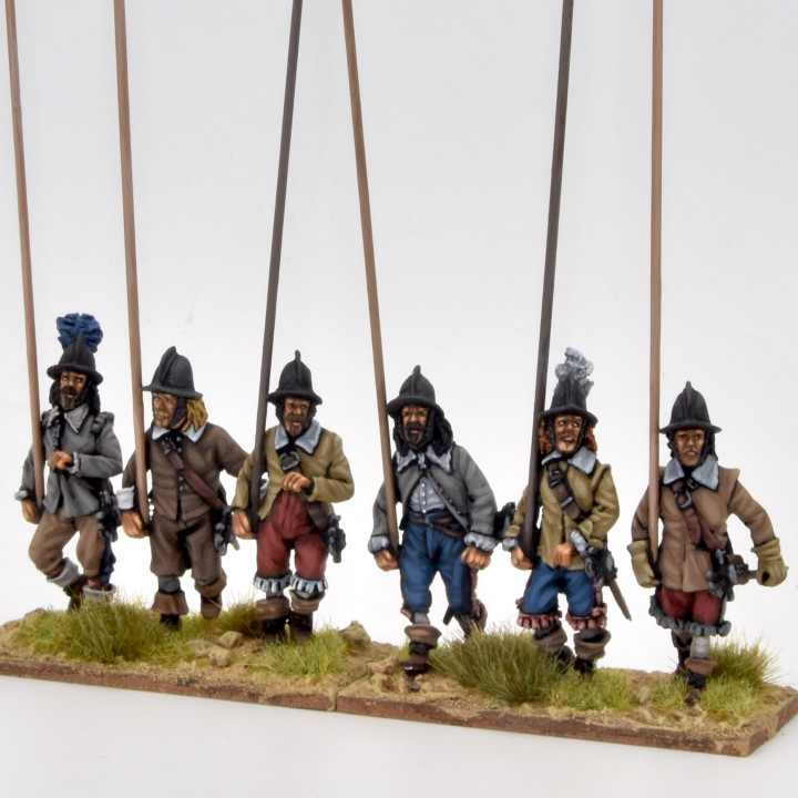 Unarmoured pikemen marching, helmets